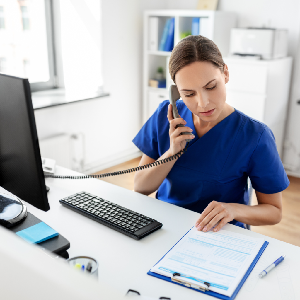 Receptionist Assisting in Phone